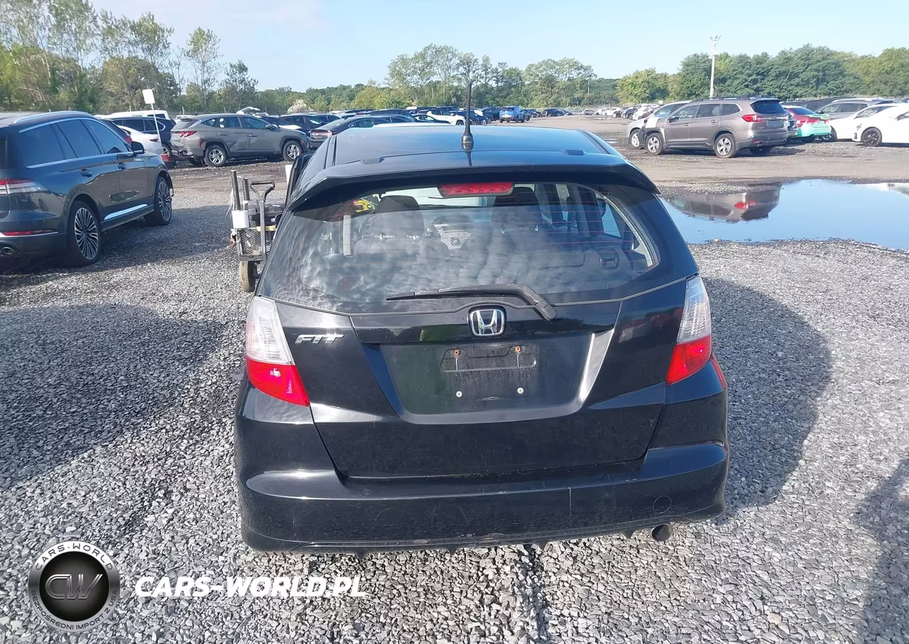 2009 Honda Fit Sport VIN:JHMGE88449S006874 - 16