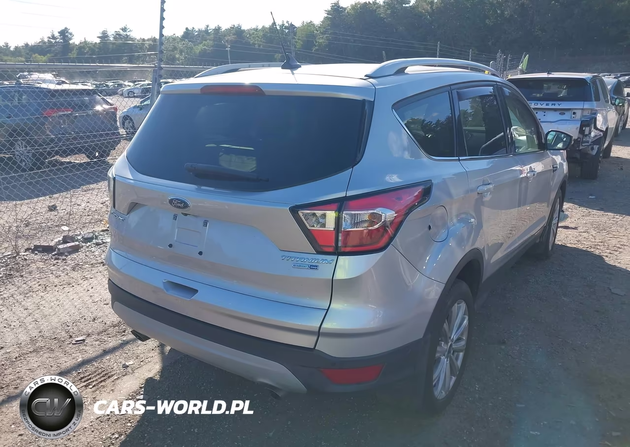 2018 Ford Escape Titanium VIN:1FMCU9J95JUD40740 - 4