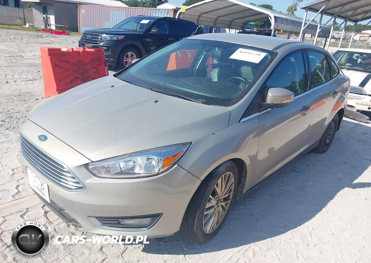 2016 Ford Focus Titanium VIN:1FADP3J20GL223832 - 2