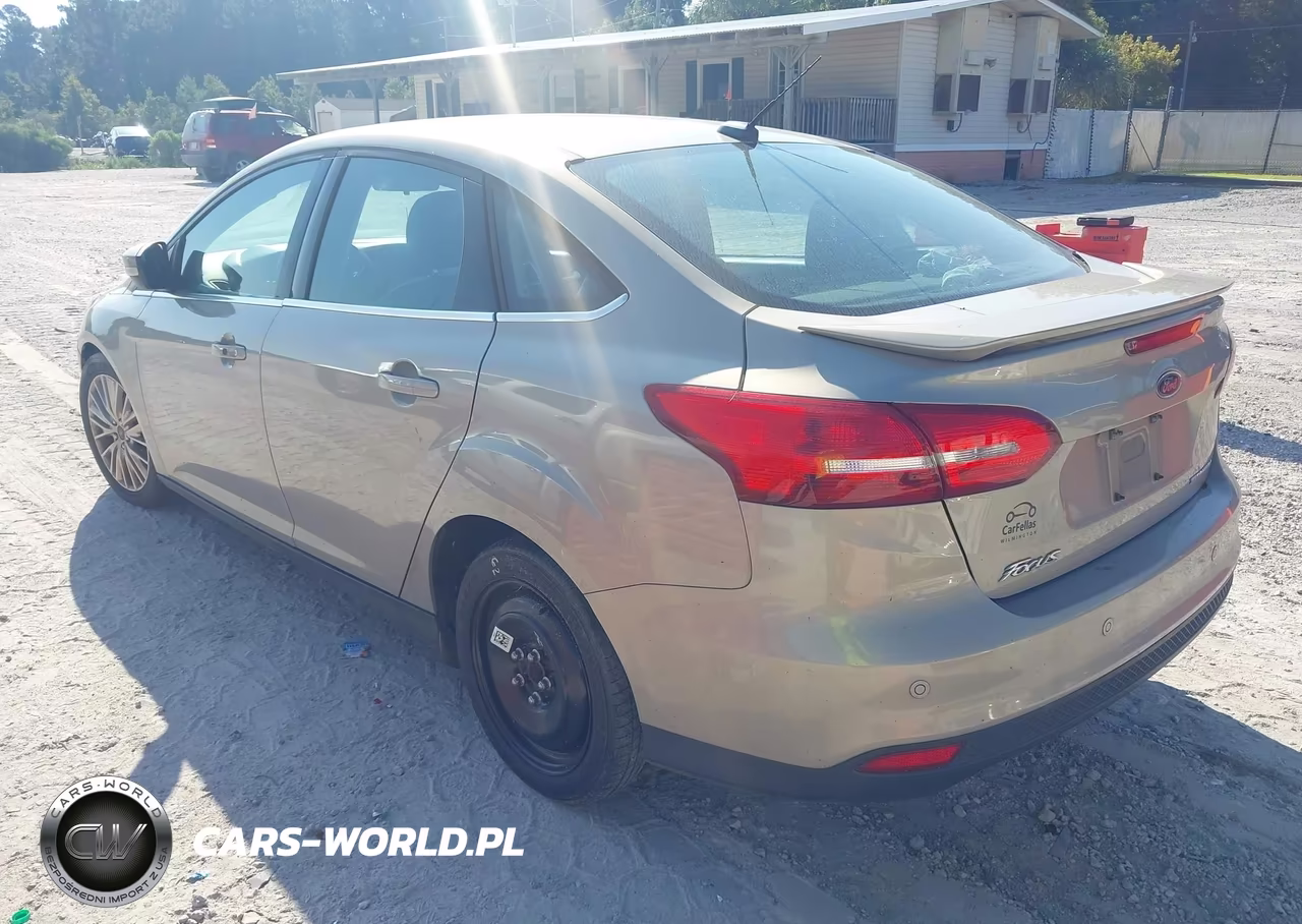 2016 Ford Focus Titanium VIN:1FADP3J20GL223832 - 3