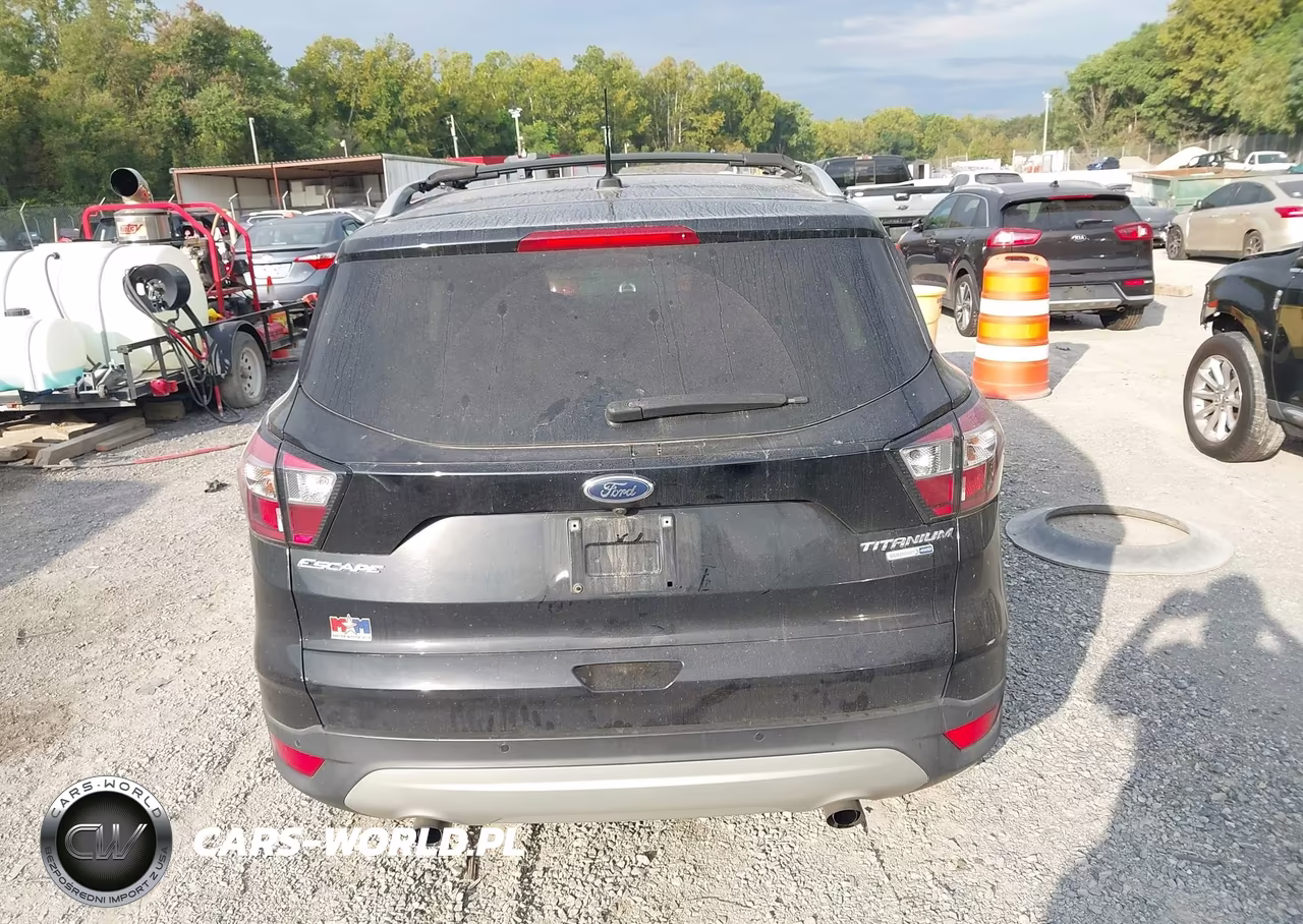 2017 Ford Escape Titanium VIN:1FMCU9J9XHUD91421 - 16