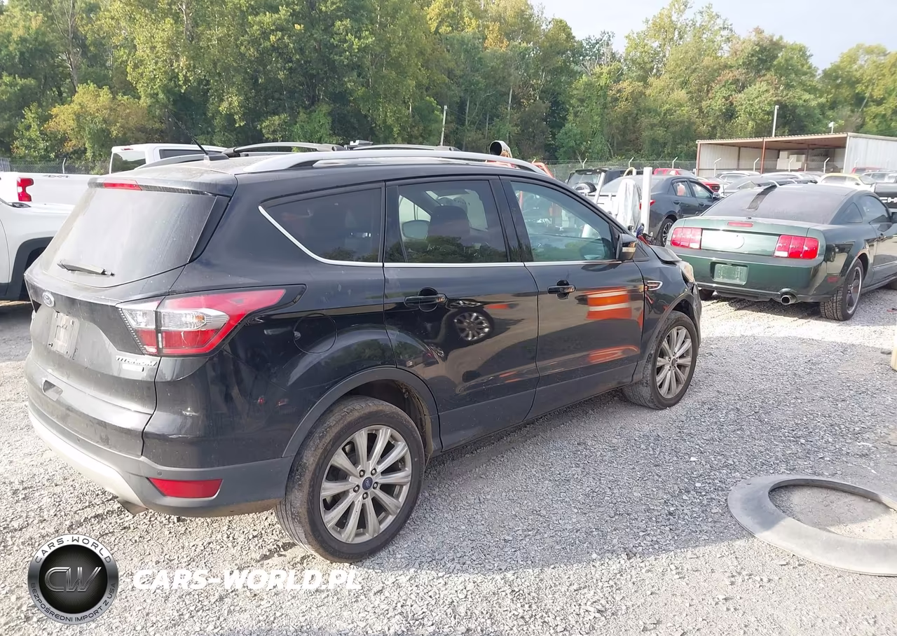 2017 Ford Escape Titanium VIN:1FMCU9J9XHUD91421 - 4