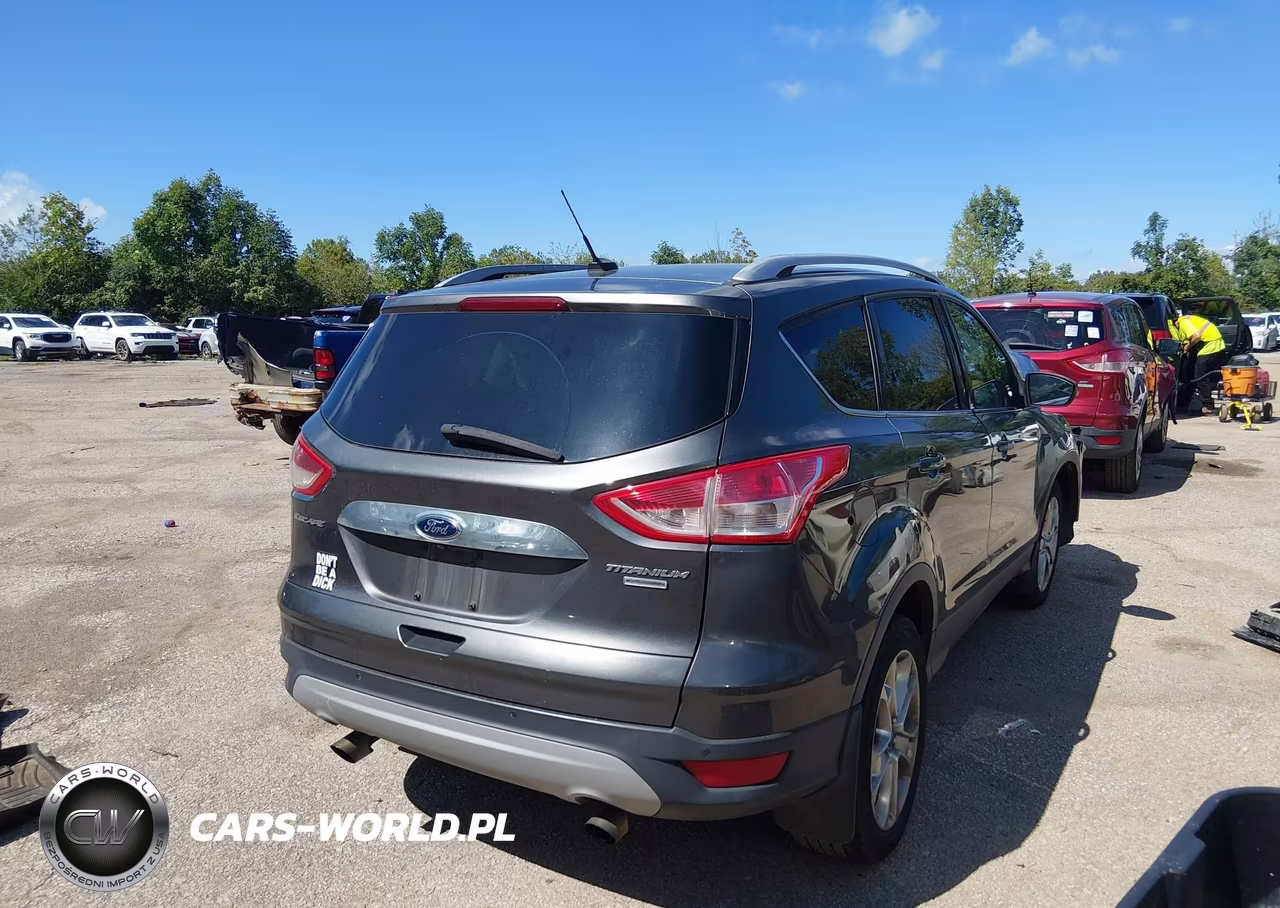 2015 Ford Escape Titanium VIN:1FMCU9J9XFUB39116 - 4