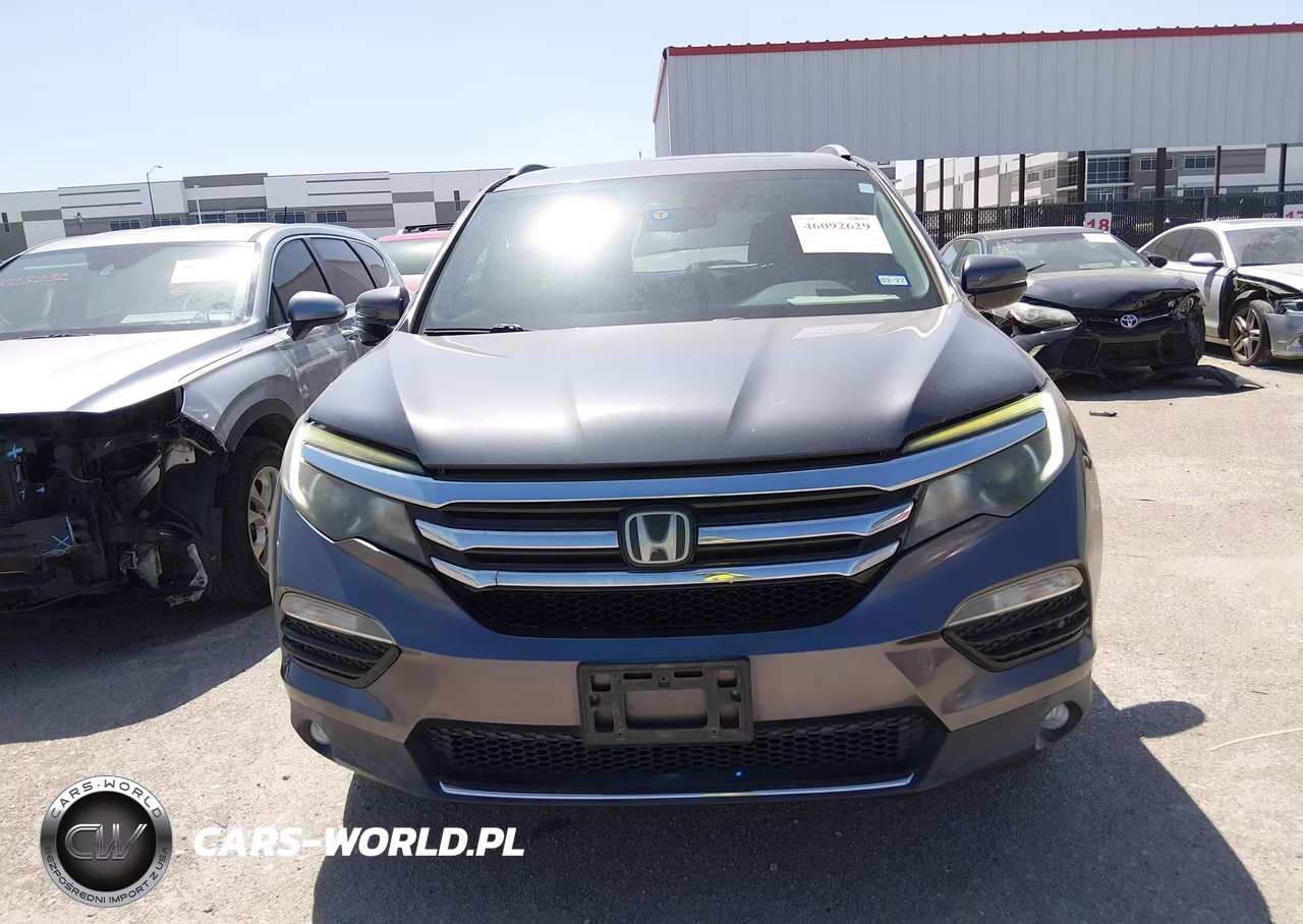 2016 Honda Pilot Touring VIN:5FNYF5H95GB034433 - 12