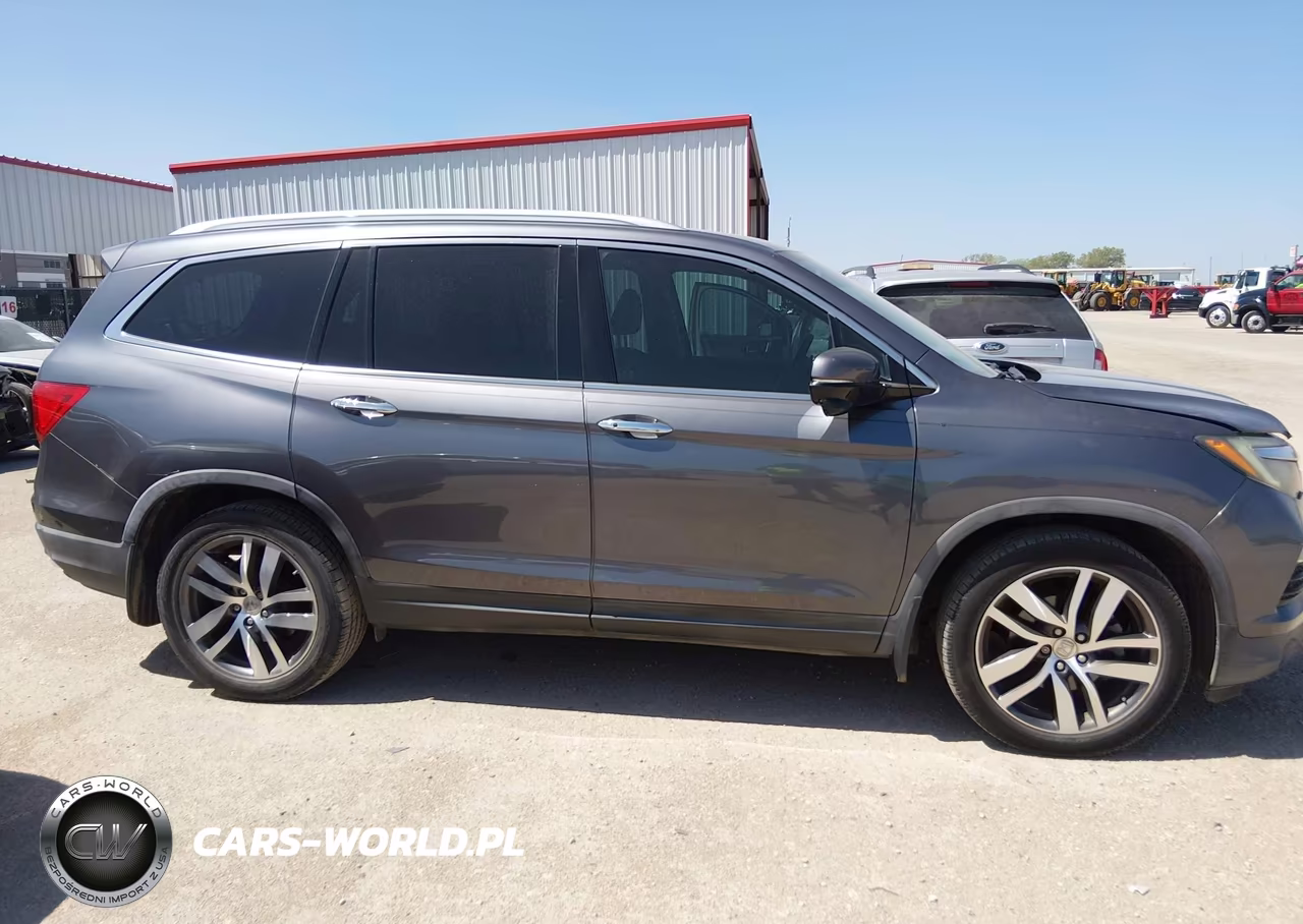 2016 Honda Pilot Touring VIN:5FNYF5H95GB034433 - 13