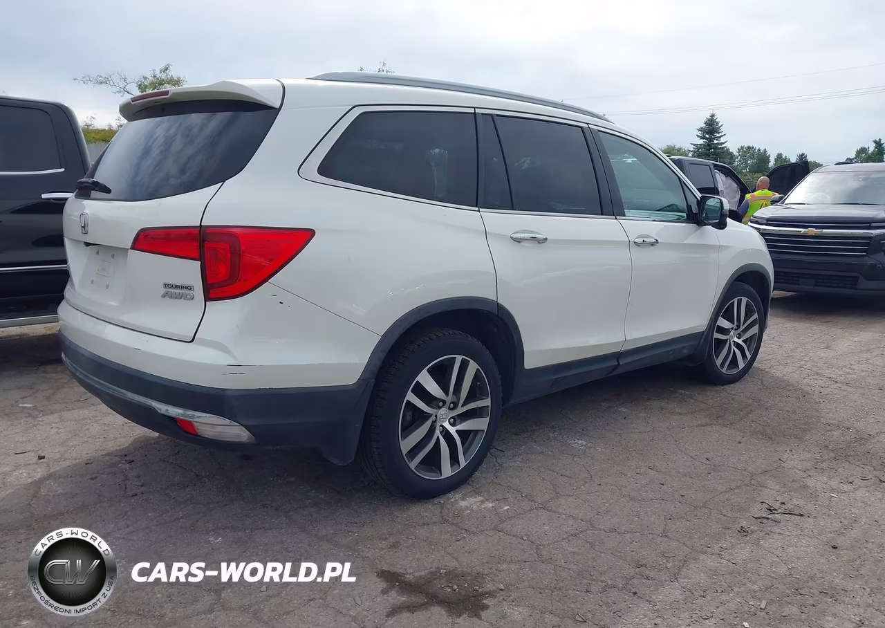 2016 Honda Pilot Touring VIN:5FNYF6H94GB025485 - 4