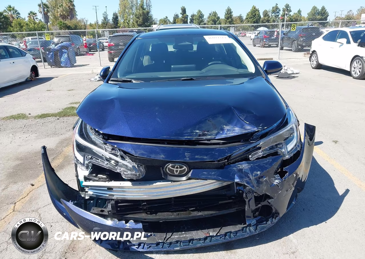 2026 Toyota Corolla Hybrid Hybrid Le VIN:JTDBCMFE6T3143967 - 12