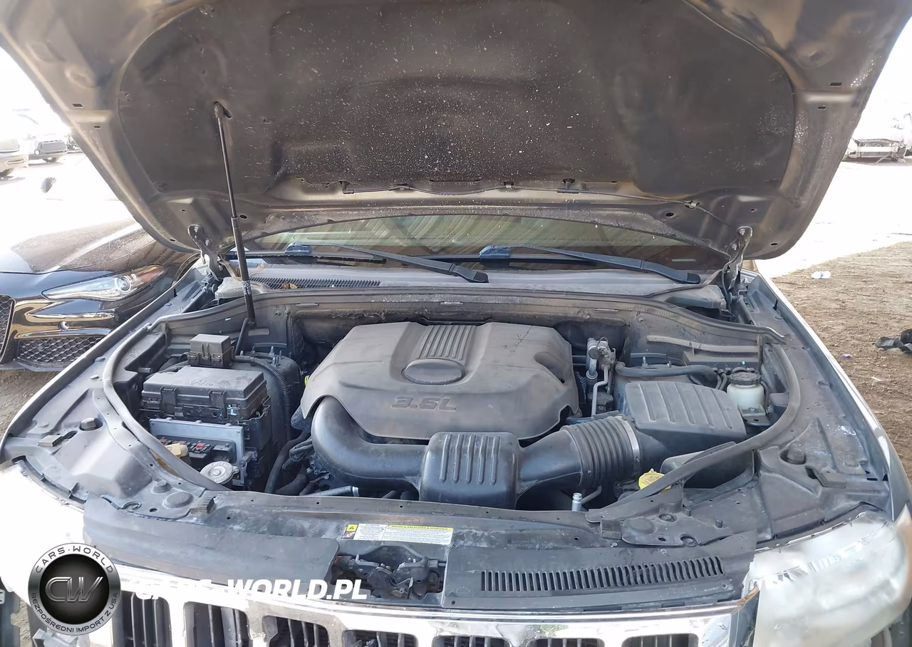 2012 Jeep Grand Cherokee Laredo VIN:1C4RJEAGXCC104074 - 10