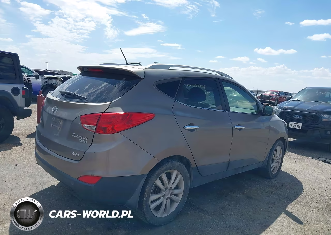 2011 Hyundai Tucson Limited VIN:KM8JUCAC0BU252910 - 4