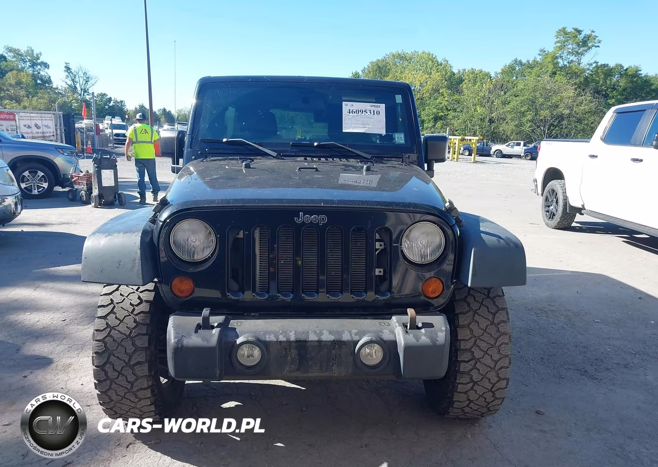 2012 Jeep Wrangler Unlimited Sport VIN:1C4BJWDG7CL246000 - 12