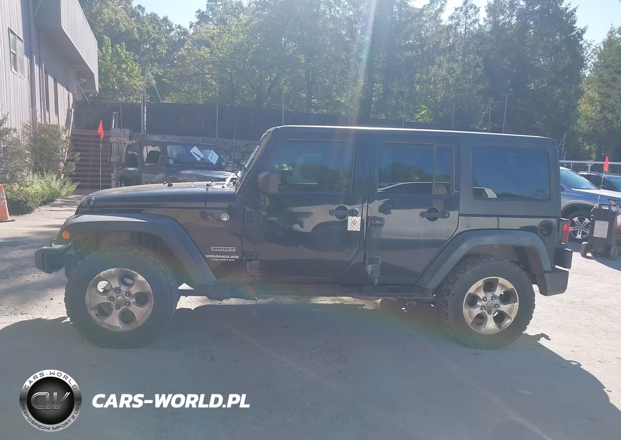 2012 Jeep Wrangler Unlimited Sport VIN:1C4BJWDG7CL246000 - 14