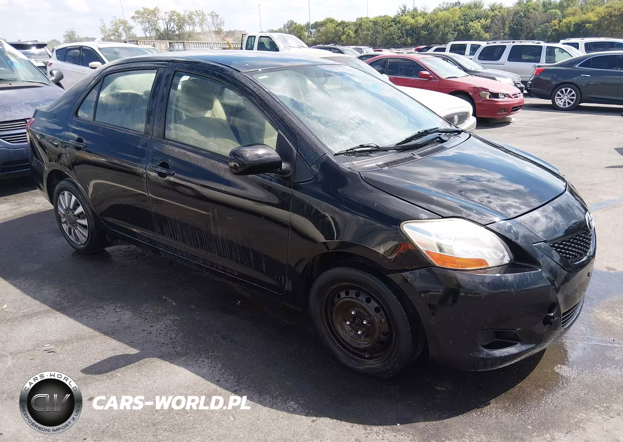 2009 Toyota Yaris VIN:JTDBT903991306748 - 1