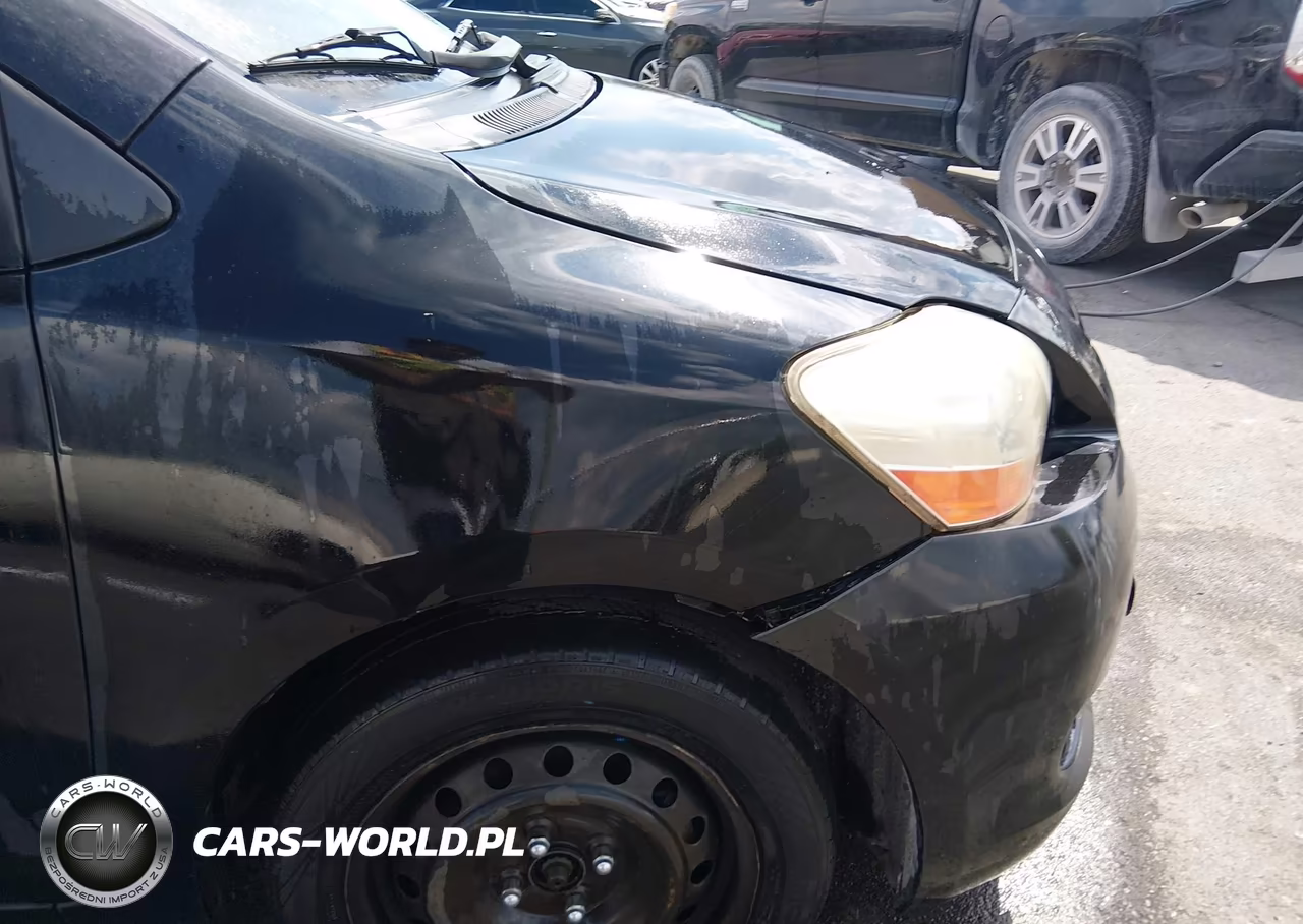 2009 Toyota Yaris VIN:JTDBT903991306748 - 12
