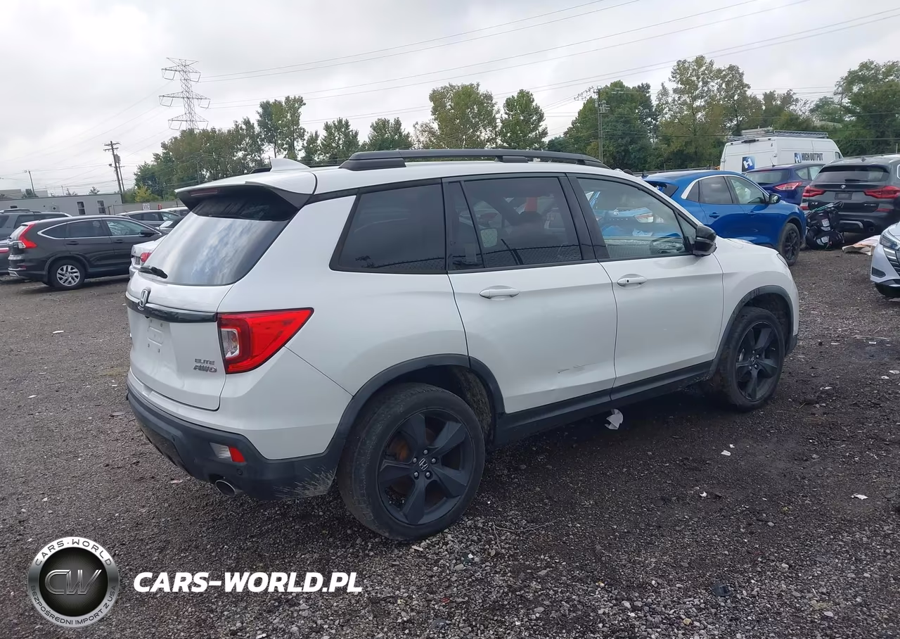 2019 Honda Passport Elite VIN:5FNYF8H09KB028260 - 4