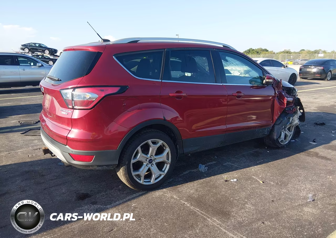 2017 Ford Escape Titanium VIN:1FMCU9JDXHUE33137 - 4