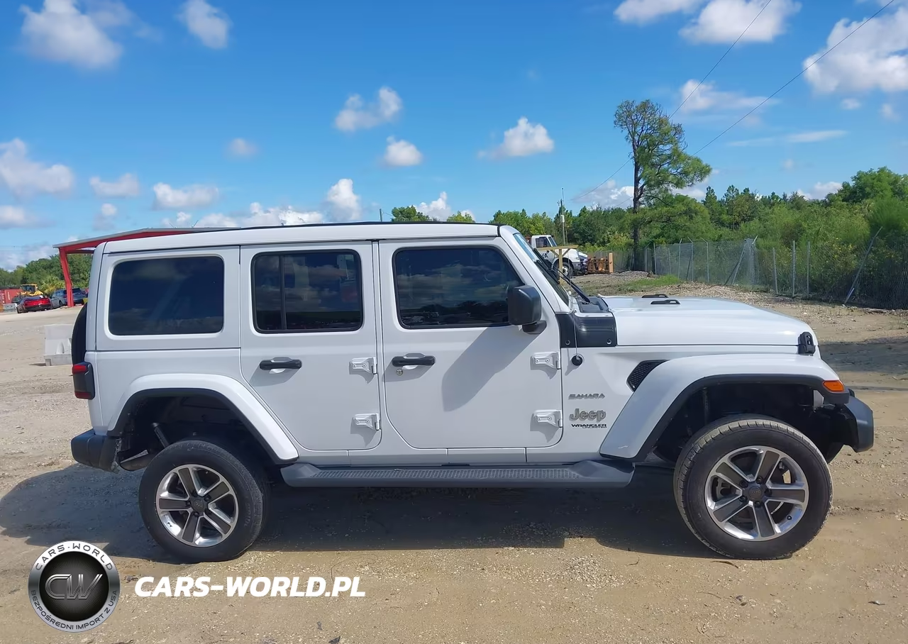 2020 Jeep Wrangler Unlimited Sahara 4X4 VIN:1C4HJXEN8LW128825 - 14