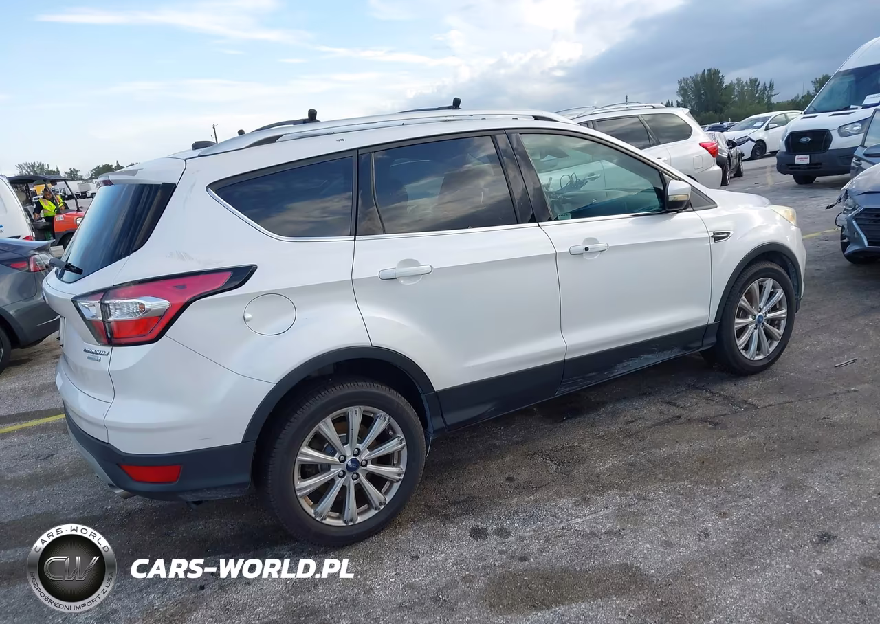 2017 Ford Escape Titanium VIN:1FMCU0J96HUD35066 - 4