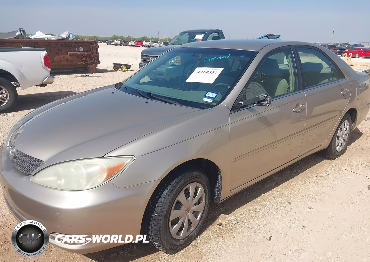 2002 Toyota Camry Le VIN:JTDBE32K220118399 - 6