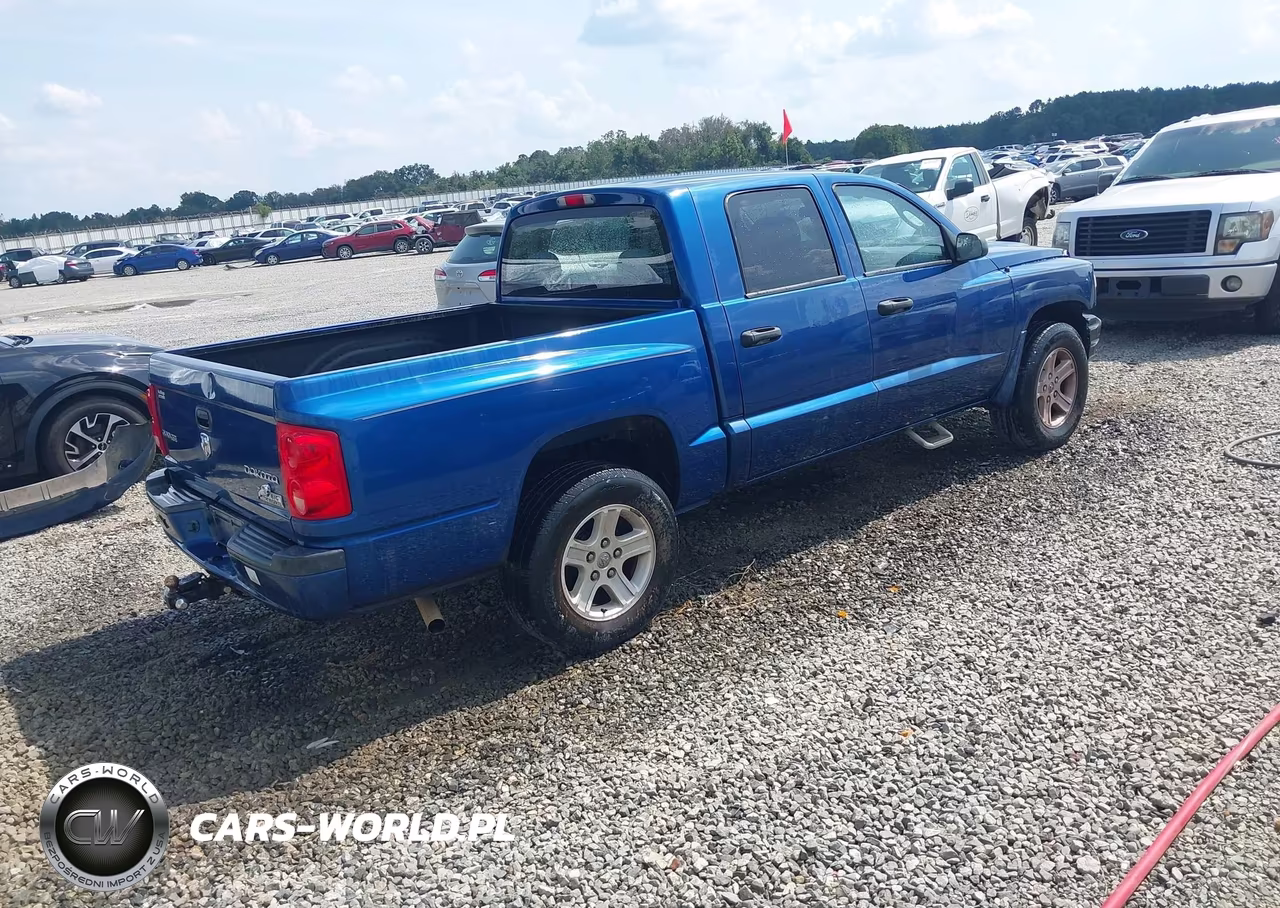 2011 Dodge Dakota VIN:1D7RE3GKXBS656091 - 4
