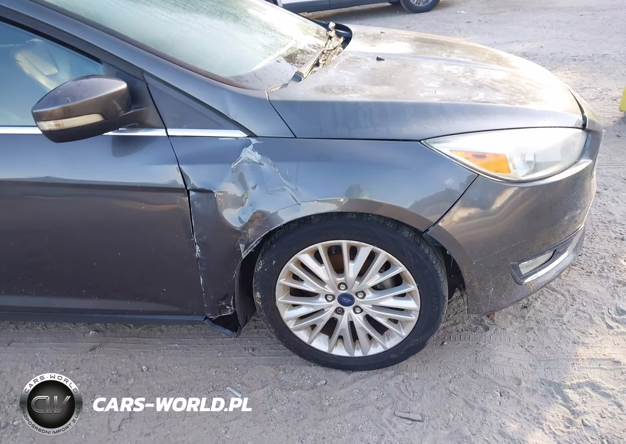 2016 Ford Focus Titanium VIN:1FADP3J27GL273868 - 12