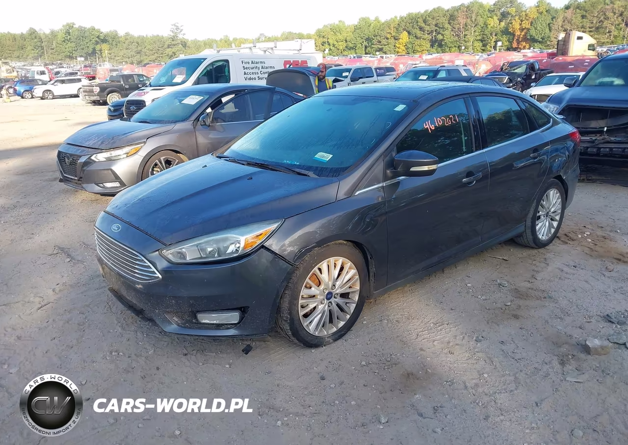 2016 Ford Focus Titanium VIN:1FADP3J27GL273868 - 2