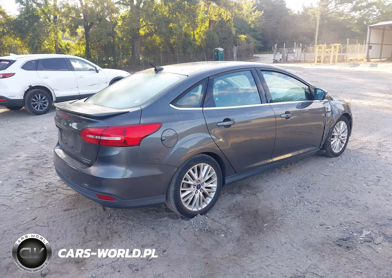 2016 Ford Focus Titanium VIN:1FADP3J27GL273868 - 4