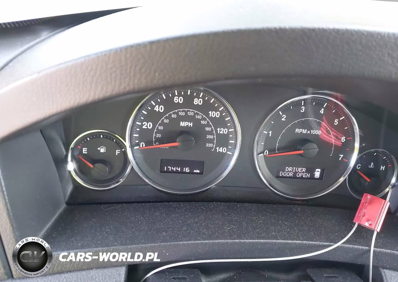 2009 Jeep Grand Cherokee Laredo VIN:1J8GR48K29C525387 - 7