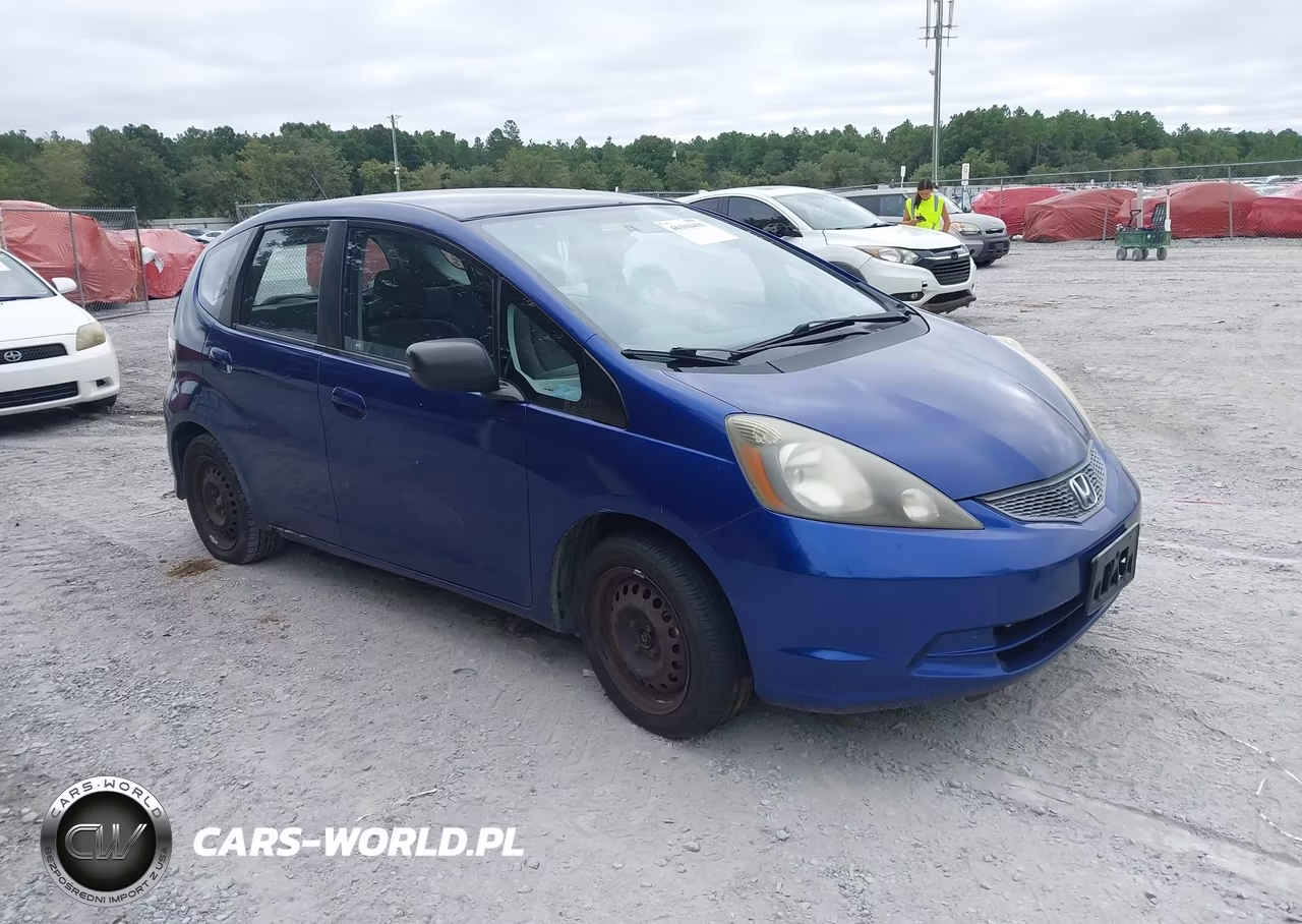 2009 Honda Fit VIN:JHMGE88299C006376 - 1