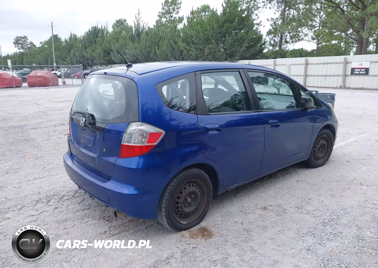 2009 Honda Fit VIN:JHMGE88299C006376 - 4