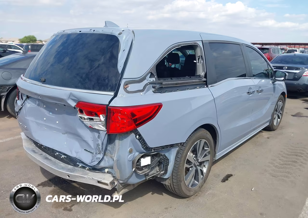 2023 Honda Odyssey Touring VIN:5FNRL6H85PB057639 - 4