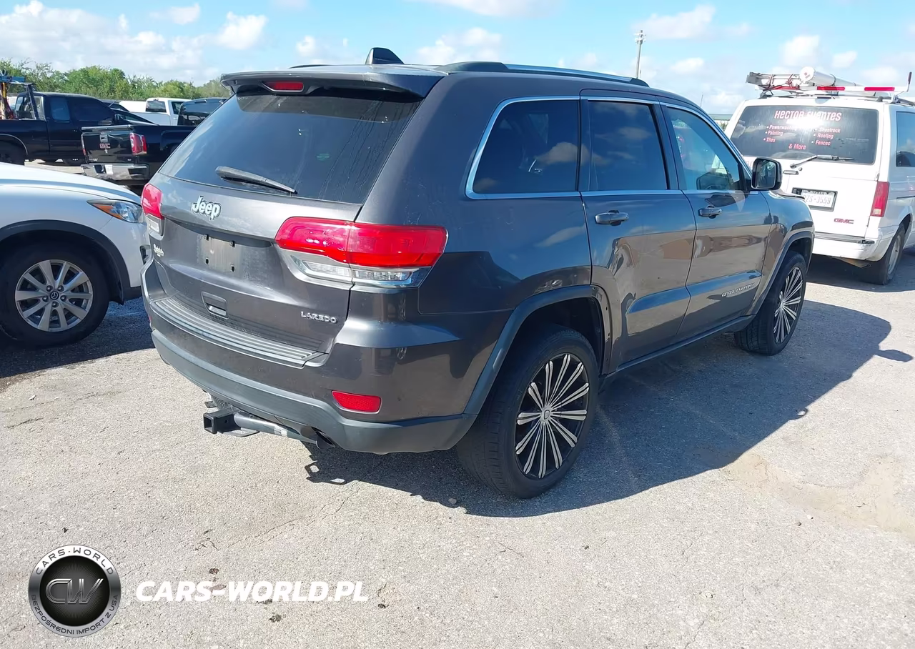 2014 Jeep Grand Cherokee Laredo VIN:1C4RJEAG7EC243405 - 4