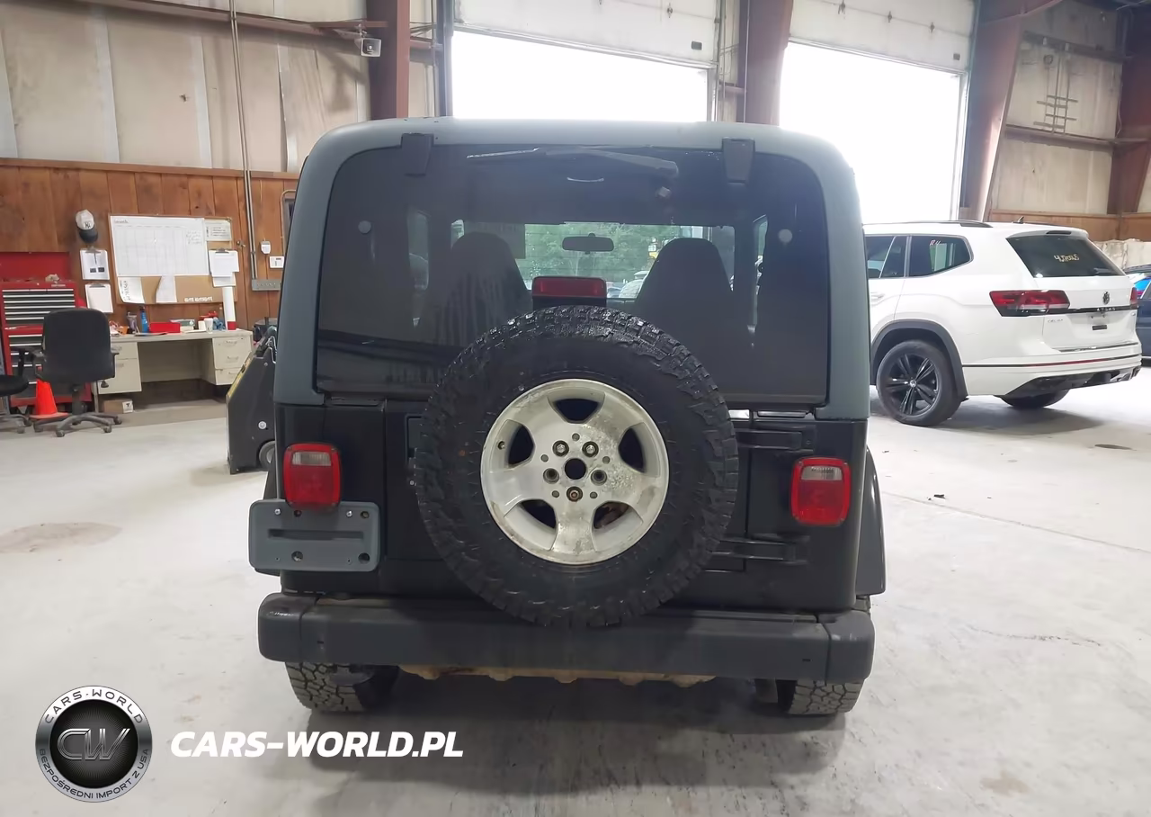 2002 Jeep Wrangler Sahara VIN:1J4FA59S32P764888 - 16