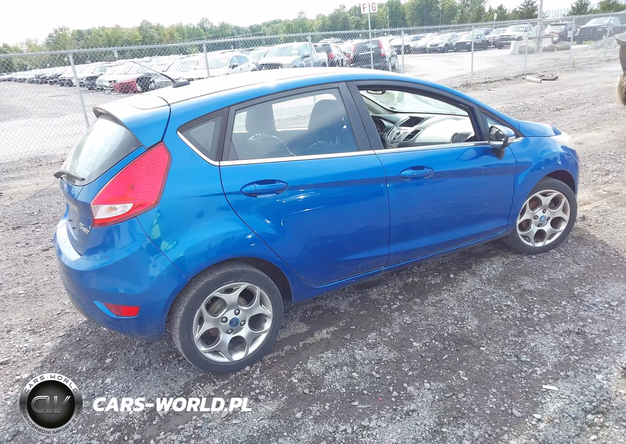 2011 Ford Fiesta Ses VIN:3FADP4FJ0BM176749 - 4