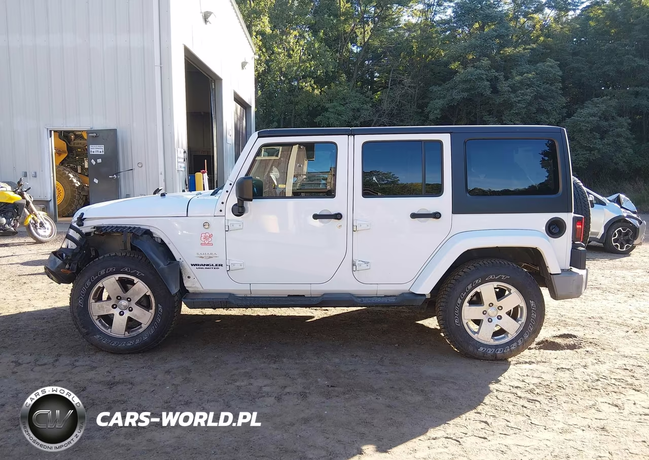 2012 Jeep Wrangler Unlimited Sahara VIN:1C4BJWEG0CL245463 - 14