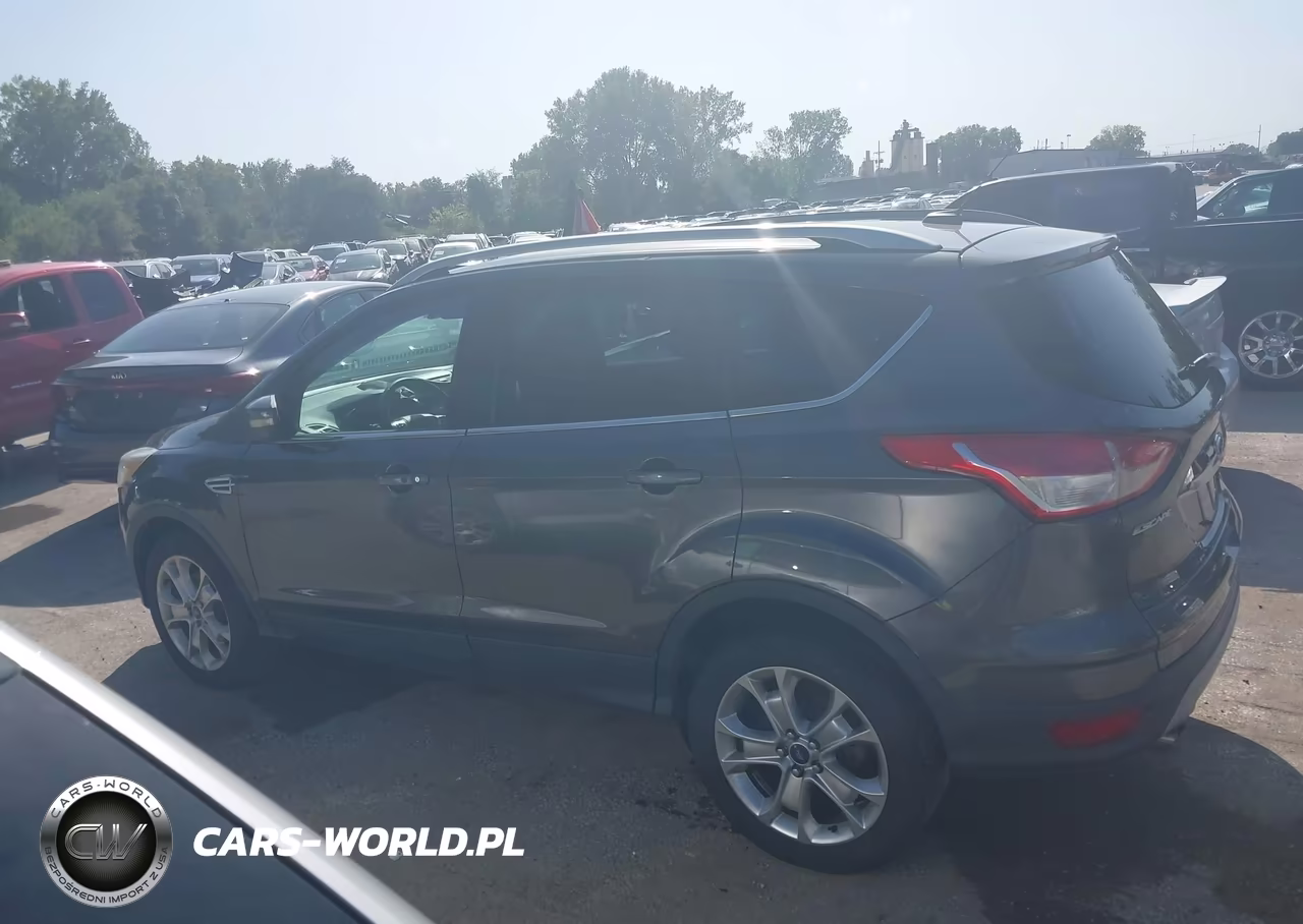 2016 Ford Escape Titanium VIN:1FMCU9J96GUC58248 - 14