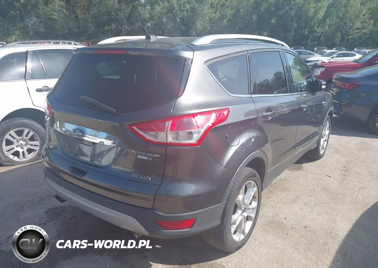 2016 Ford Escape Titanium VIN:1FMCU9J96GUC58248 - 4