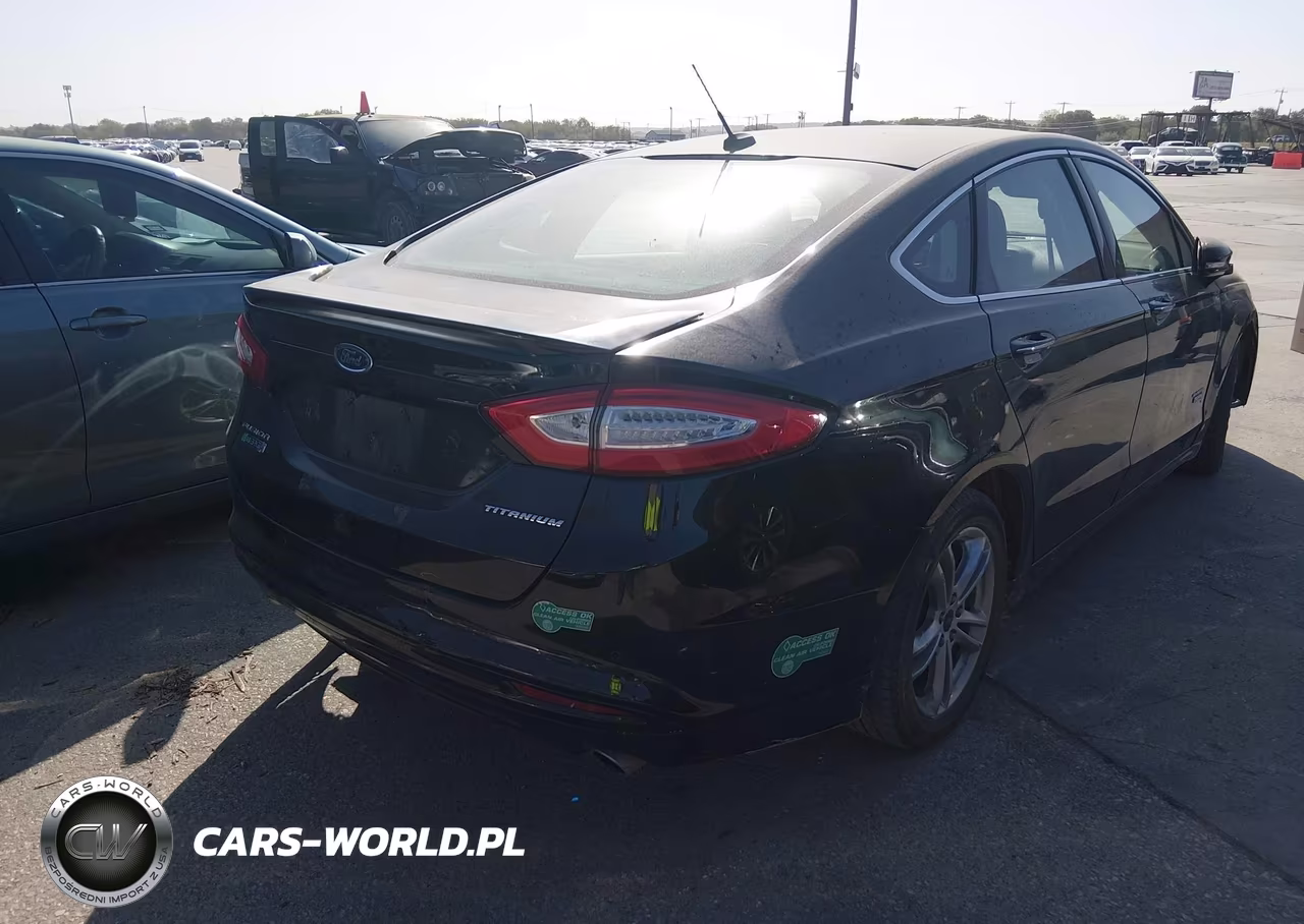 2016 Ford Fusion Energi Titanium VIN:3FA6P0SU4GR134046 - 4