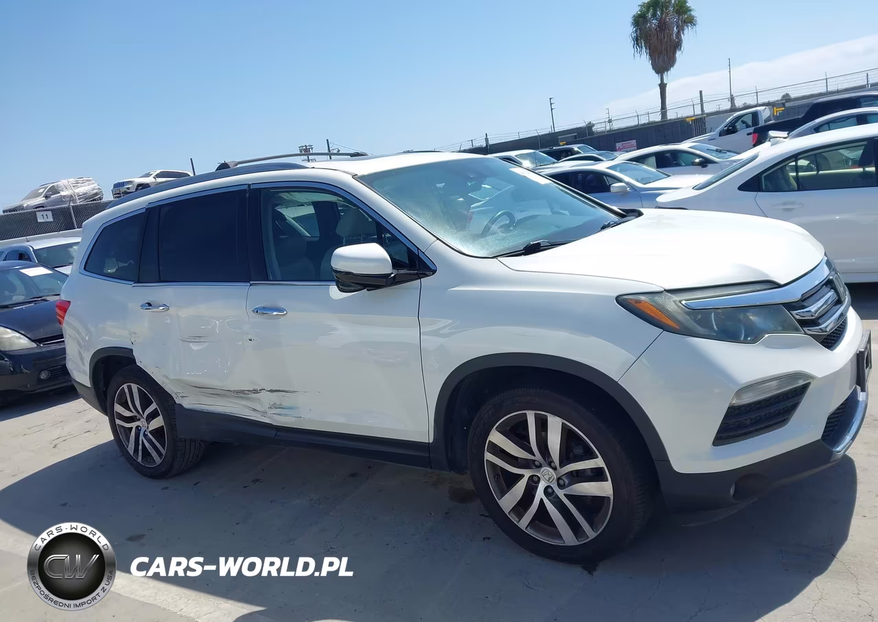 2016 Honda Pilot Touring VIN:5FNYF6H9XGB127860 - 13
