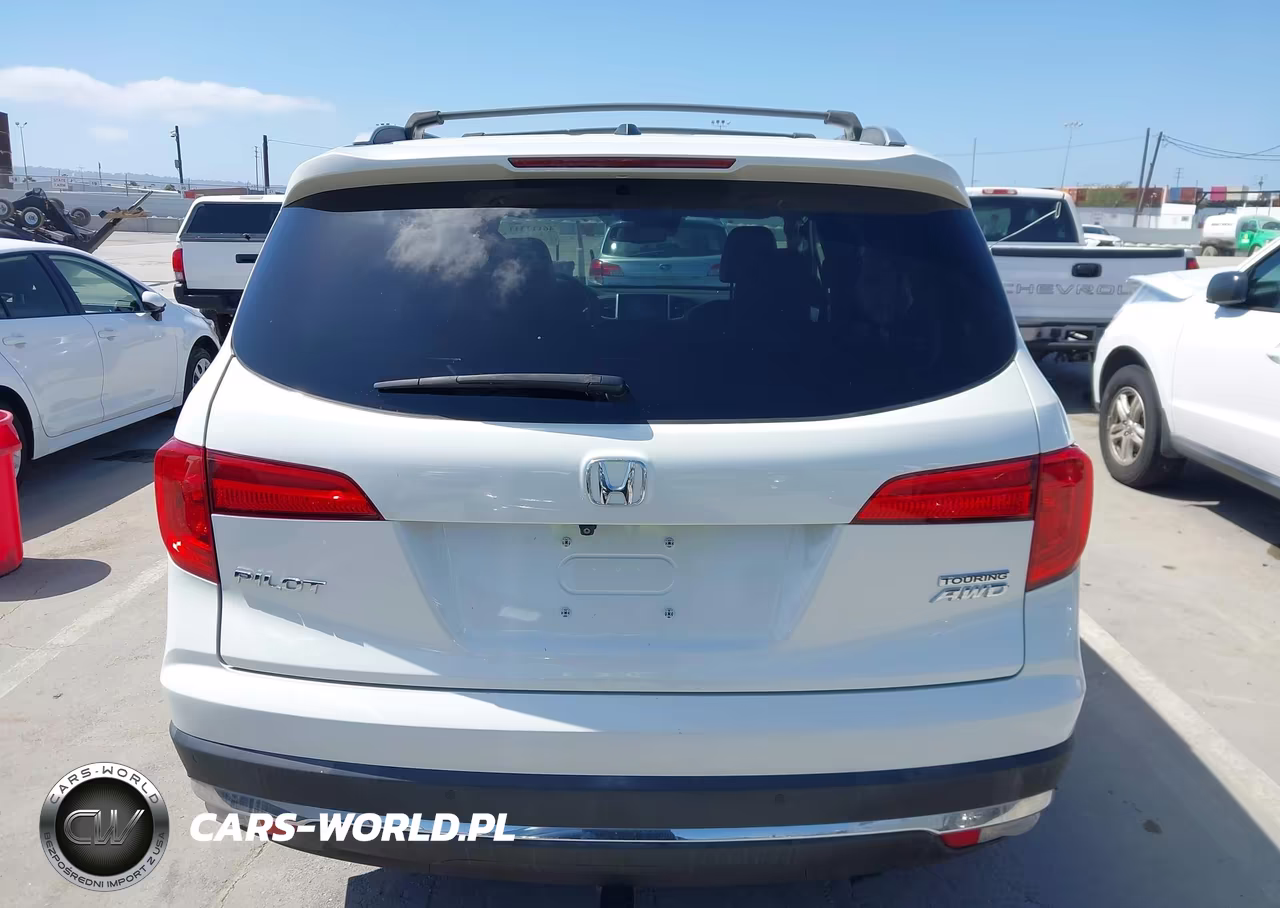 2016 Honda Pilot Touring VIN:5FNYF6H9XGB127860 - 16