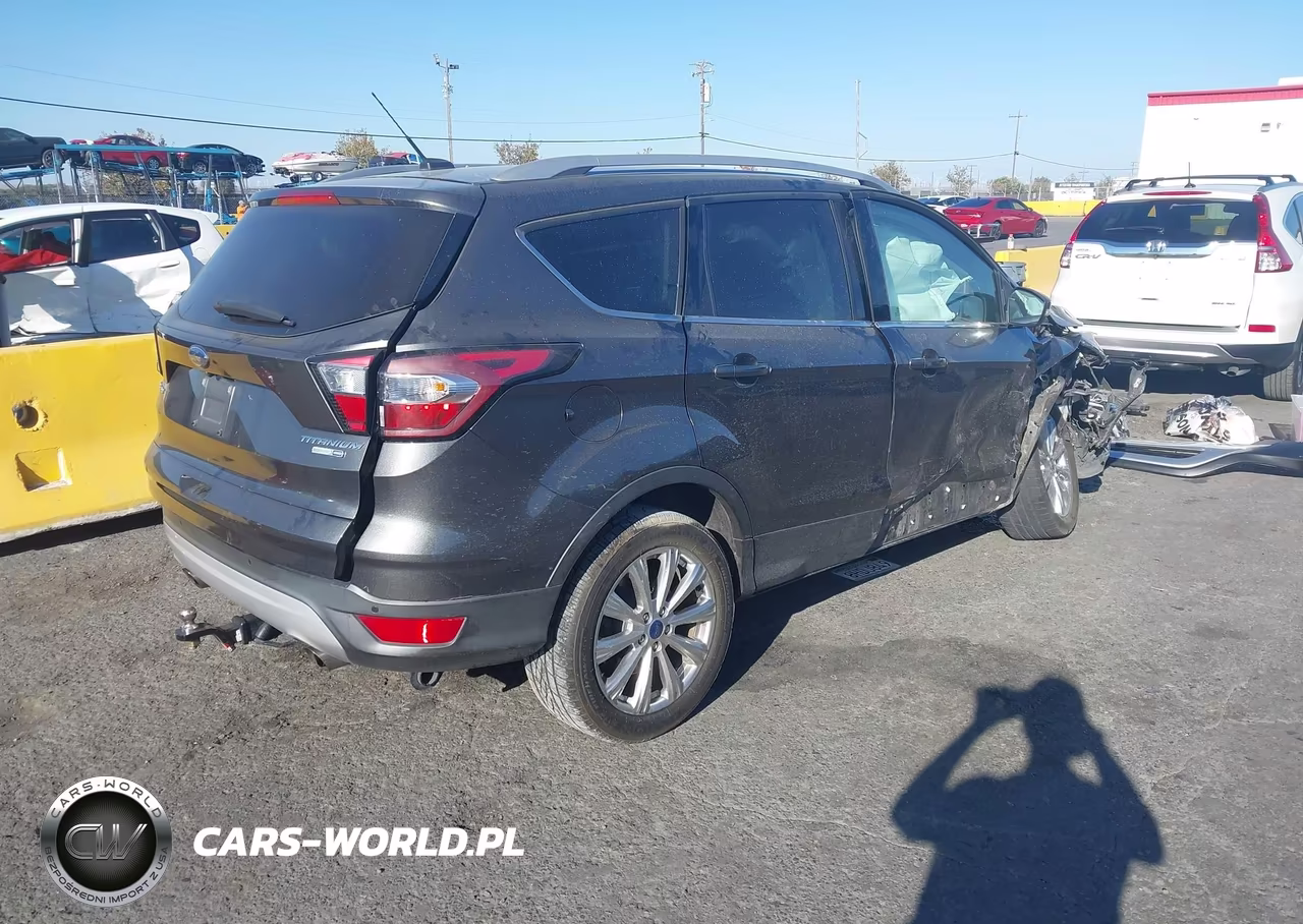 2017 Ford Escape Titanium VIN:1FMCU9J95HUB03899 - 4