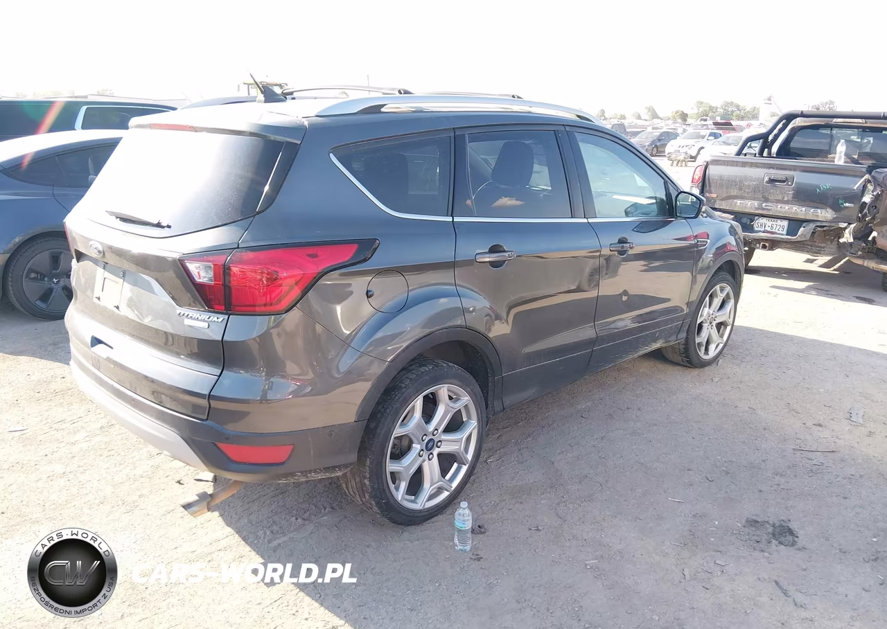 2019 Ford Escape Titanium VIN:1FMCU0J93KUA97734 - 4