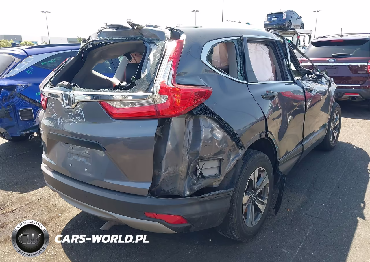 2018 Honda Cr-V Lx VIN:2HKRW5H35JH423629 - 4
