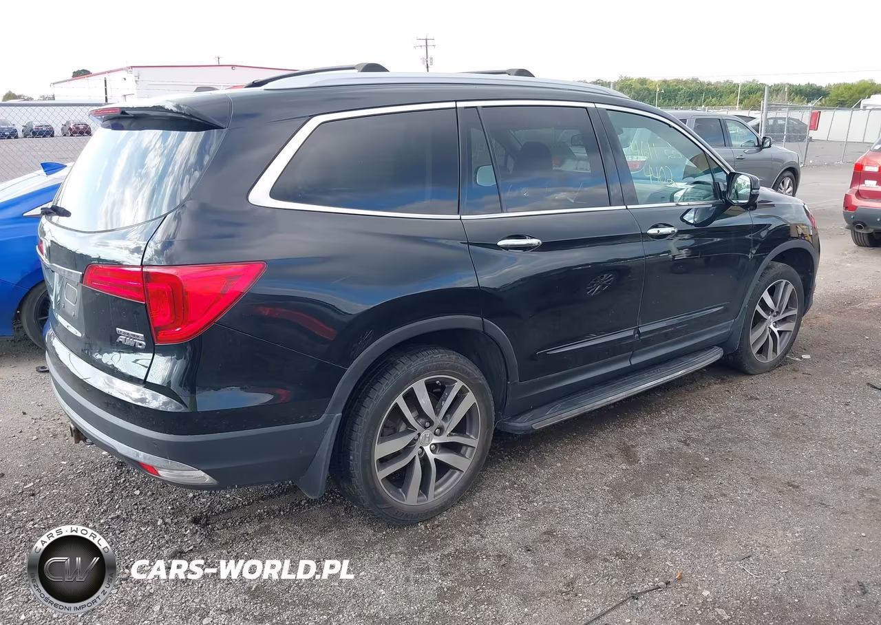 2016 Honda Pilot Touring VIN:5FNYF6H97GB047352 - 4