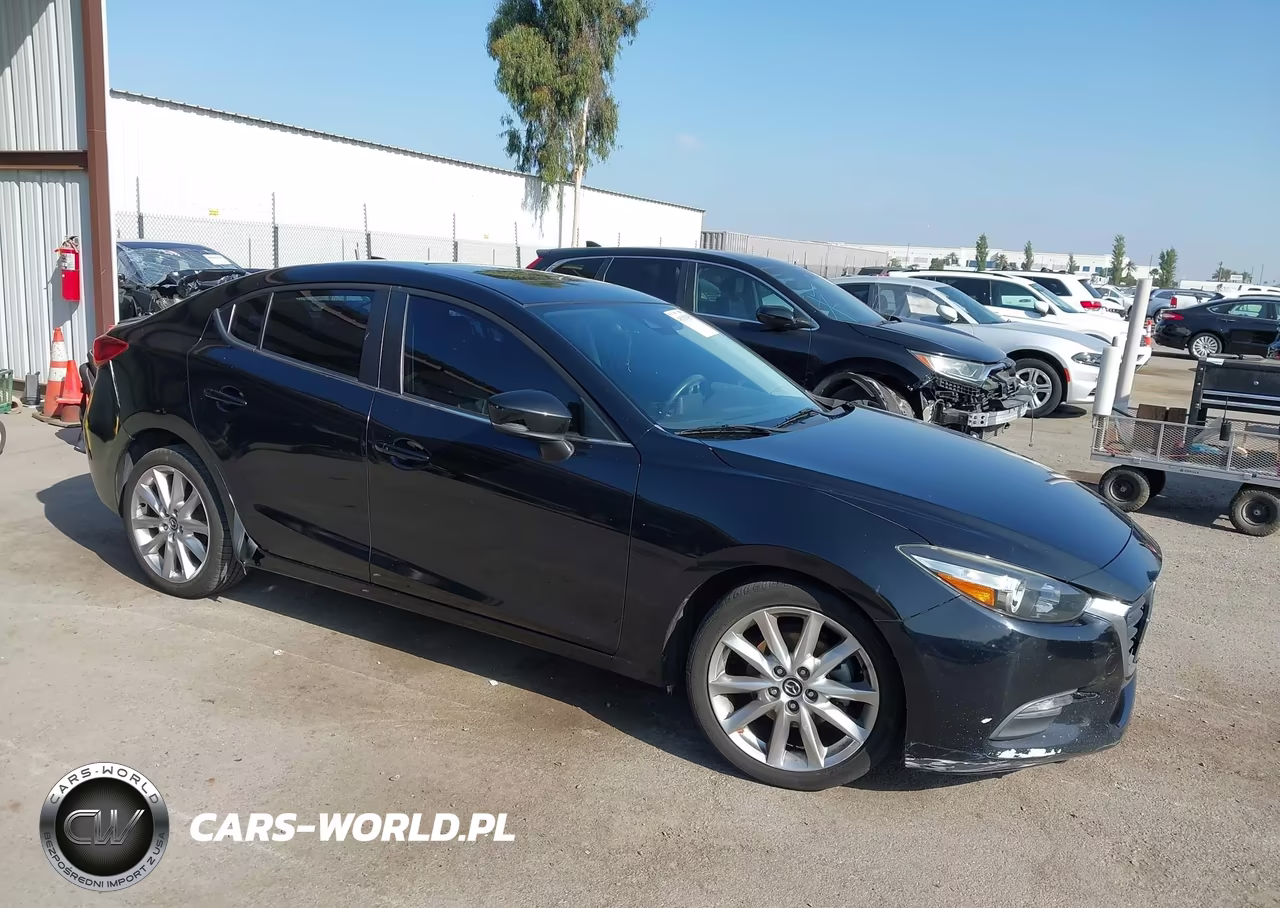 2017 Mazda Mazda3 Touring VIN:3MZBN1V77HM120678 - 1