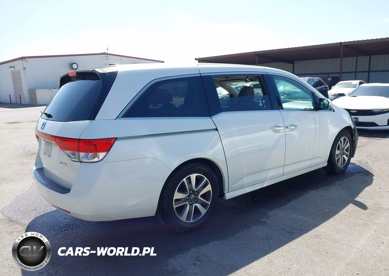 2016 Honda Odyssey Touring-Touring Elite VIN:5FNRL5H91GB123283 - 4