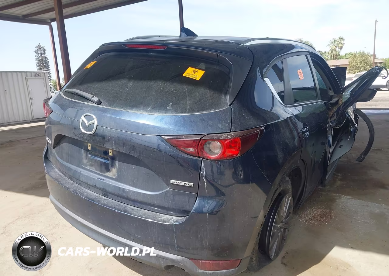2021 Mazda Cx-5 Touring VIN:JM3KFACM3M1324787 - 4