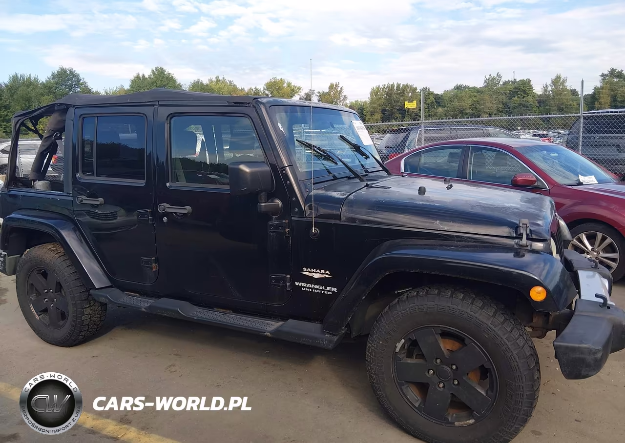 2008 Jeep Wrangler Unlimited Sahara VIN:1J4GA59168L600823 - 13