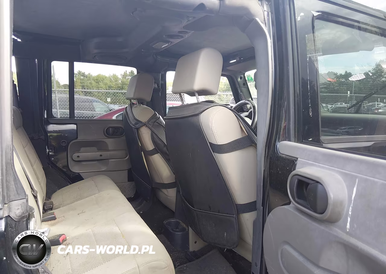 2008 Jeep Wrangler Unlimited Sahara VIN:1J4GA59168L600823 - 8