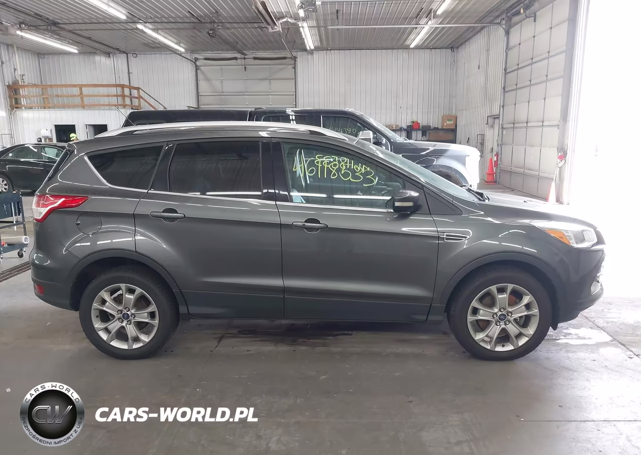 2016 Ford Escape Titanium VIN:1FMCU9J93GUC40984 - 13