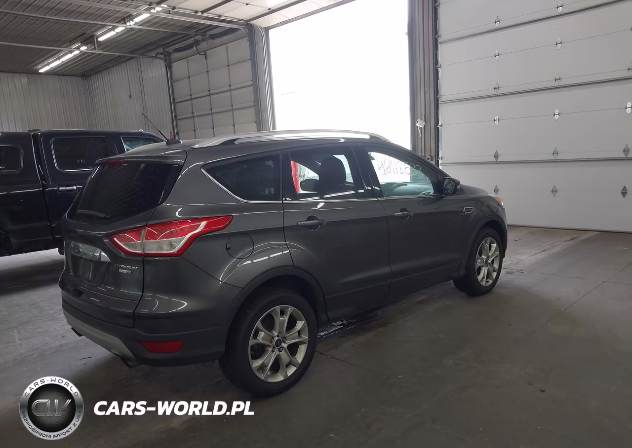 2016 Ford Escape Titanium VIN:1FMCU9J93GUC40984 - 4